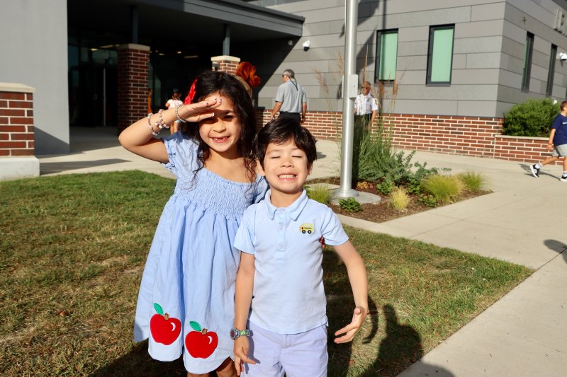 A sunny day greets students at Lewes Elementary School, including first-grader Ellie Schmidt and her younger brother, Donnie. BILL SHULL PHOTO